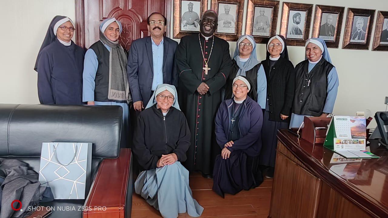 Land donation with the Archbishop of Nairobi